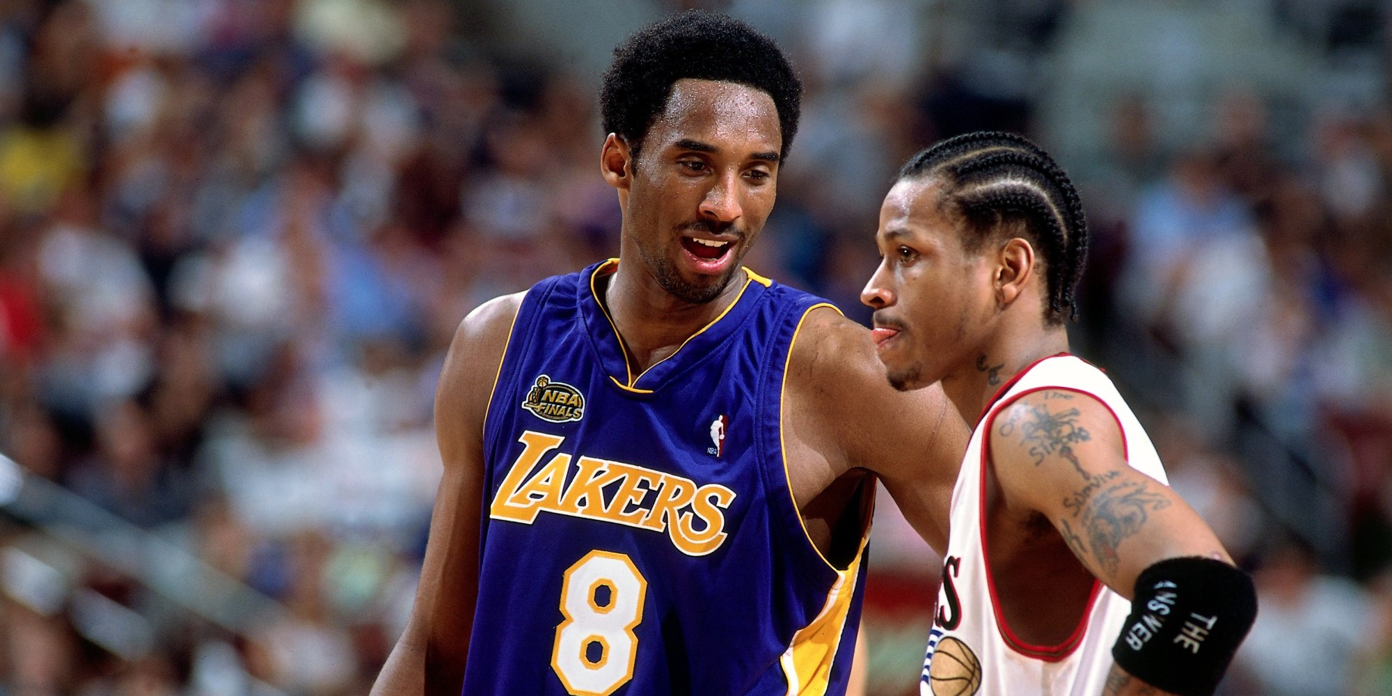 PHILADELPHIA - JUNE 15: Kobe Bryant #8 of the Los Angeles Lakers chats with Allen Iverson #3 of the Philadelphia76ers during game five of the 2001 NBA Finals played June 15, 2001 at the First Union Center in Philadelphia, Pennsylvania. NOTE TO USER: User expressly acknowledges that, by downloading and or using this photograph, User is consenting to the terms and conditions of the Getty Images License agreement. Mandatory Copyright Notice: Copyright 2001 NBAE (Photo by Andrew D. Bernstein/NBAE via Getty Images)